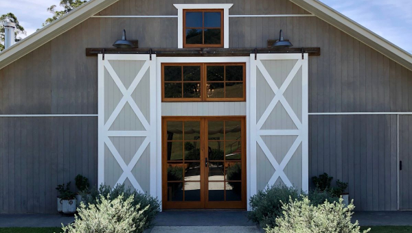 Front elevation of beautiful, modern Texas barndominium.