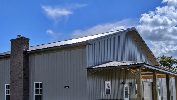 Texas metal building with a brick chimney.